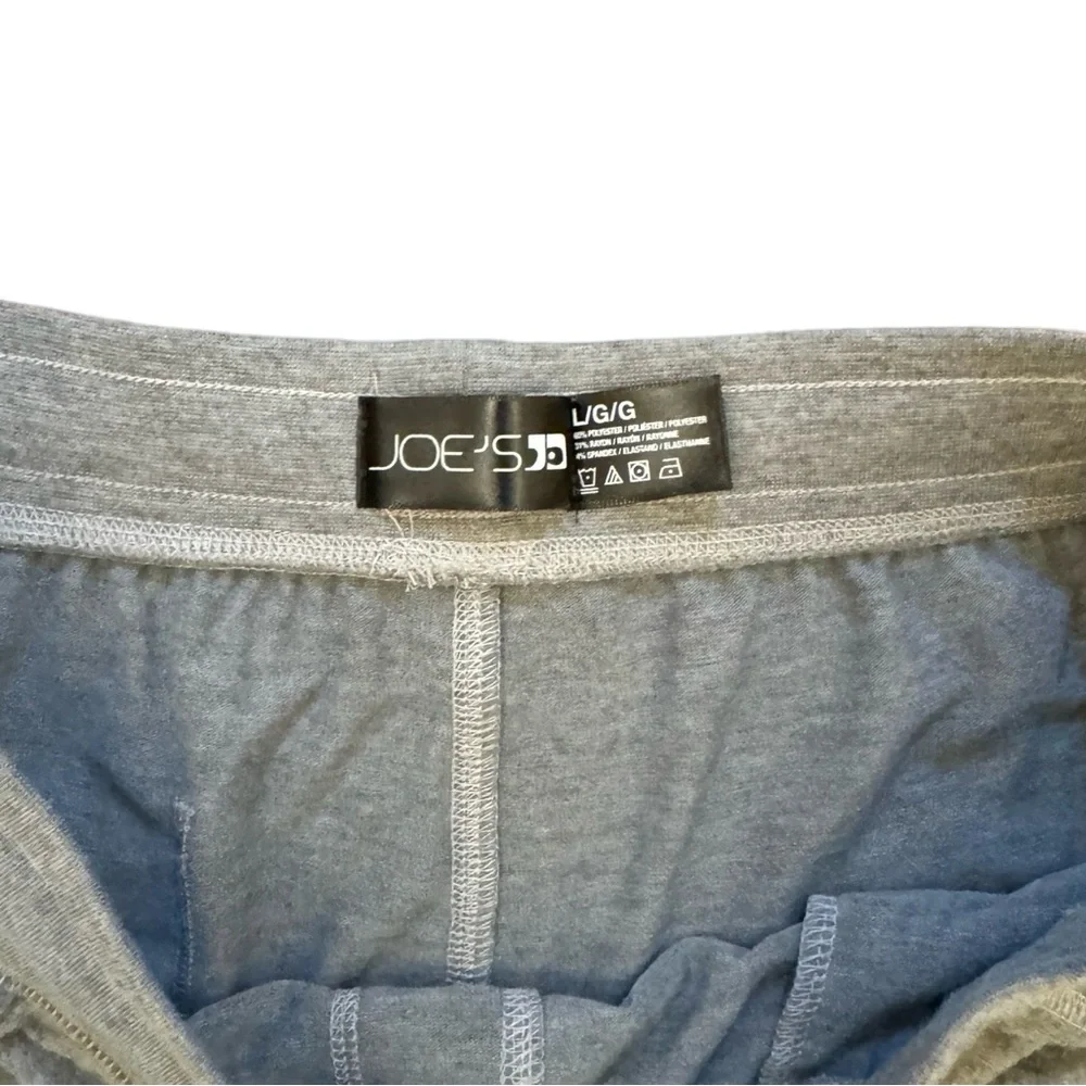 Joe’s gray sweatpants. Large